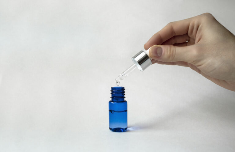 flacon bleu verre huile essentielle poppers